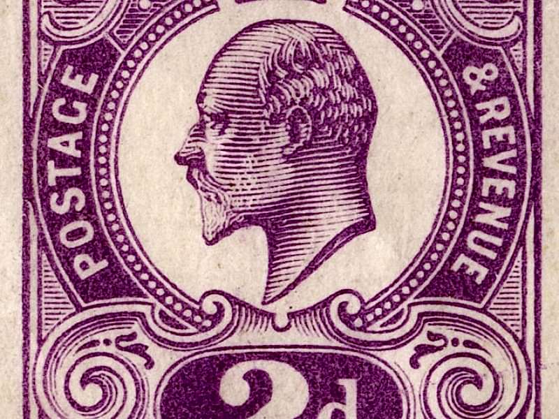 A closeup view of an individual purple stamp, with a portrait of King Edward VII in the middle with a crown, and the words 'Postage & Revenue 2d' around the portrait.